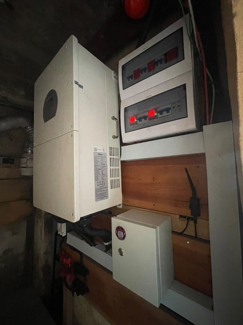 Inverter and control panel installed on a wall